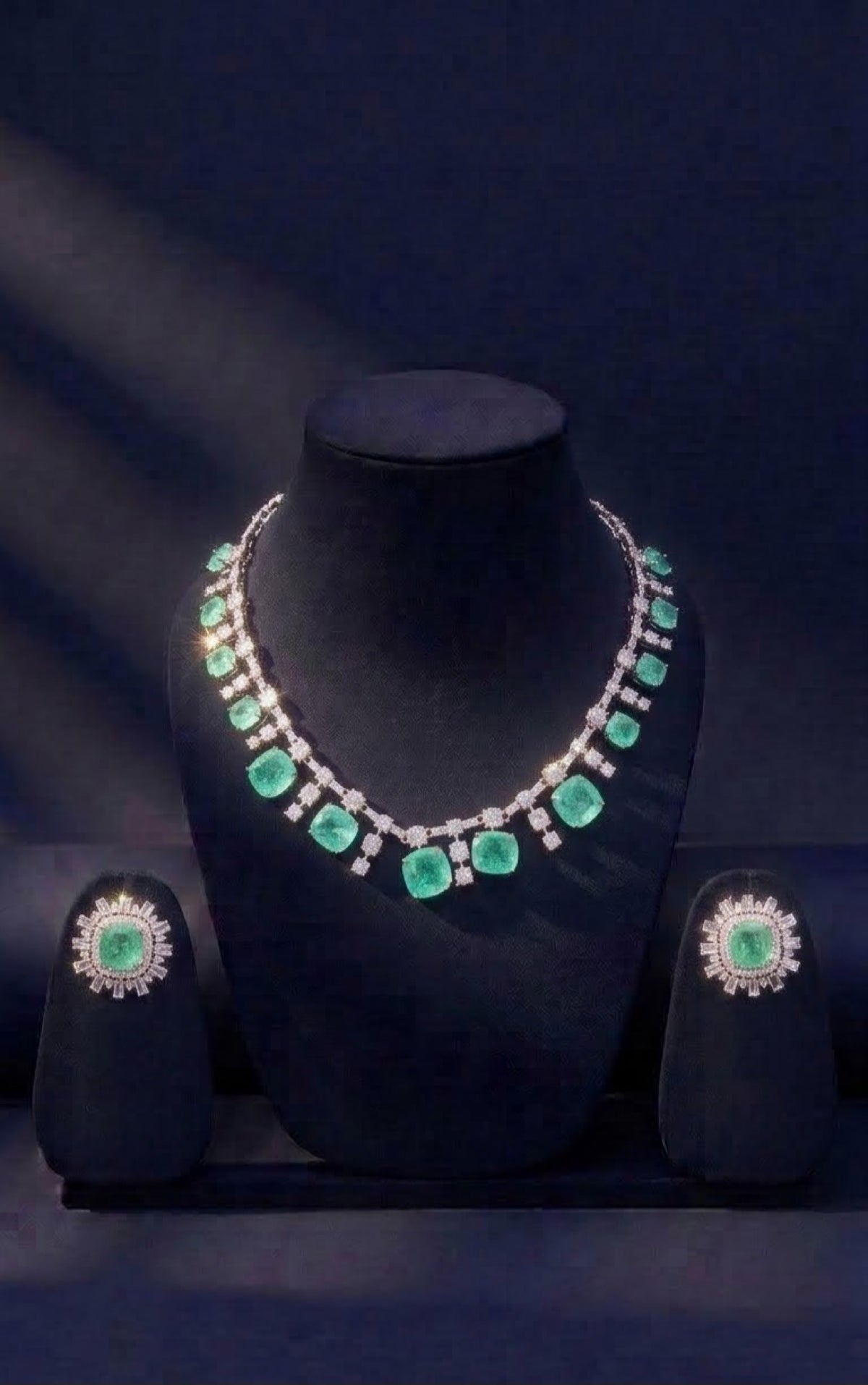 Silver-tone necklace set with mint-green stones and starburst stud earrings