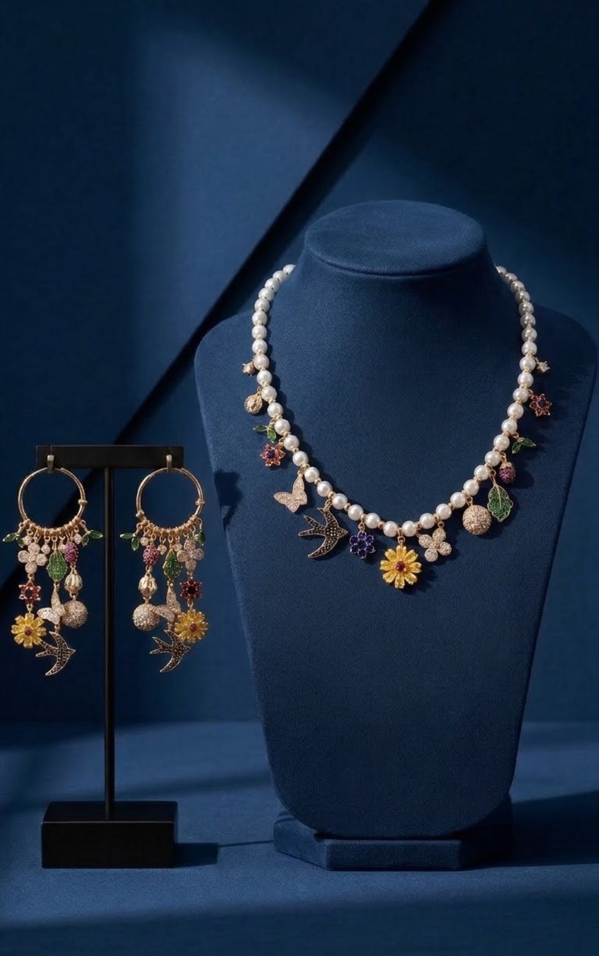 Faux pearl charm necklace set with butterfly, bird and flower charms and hoop earrings