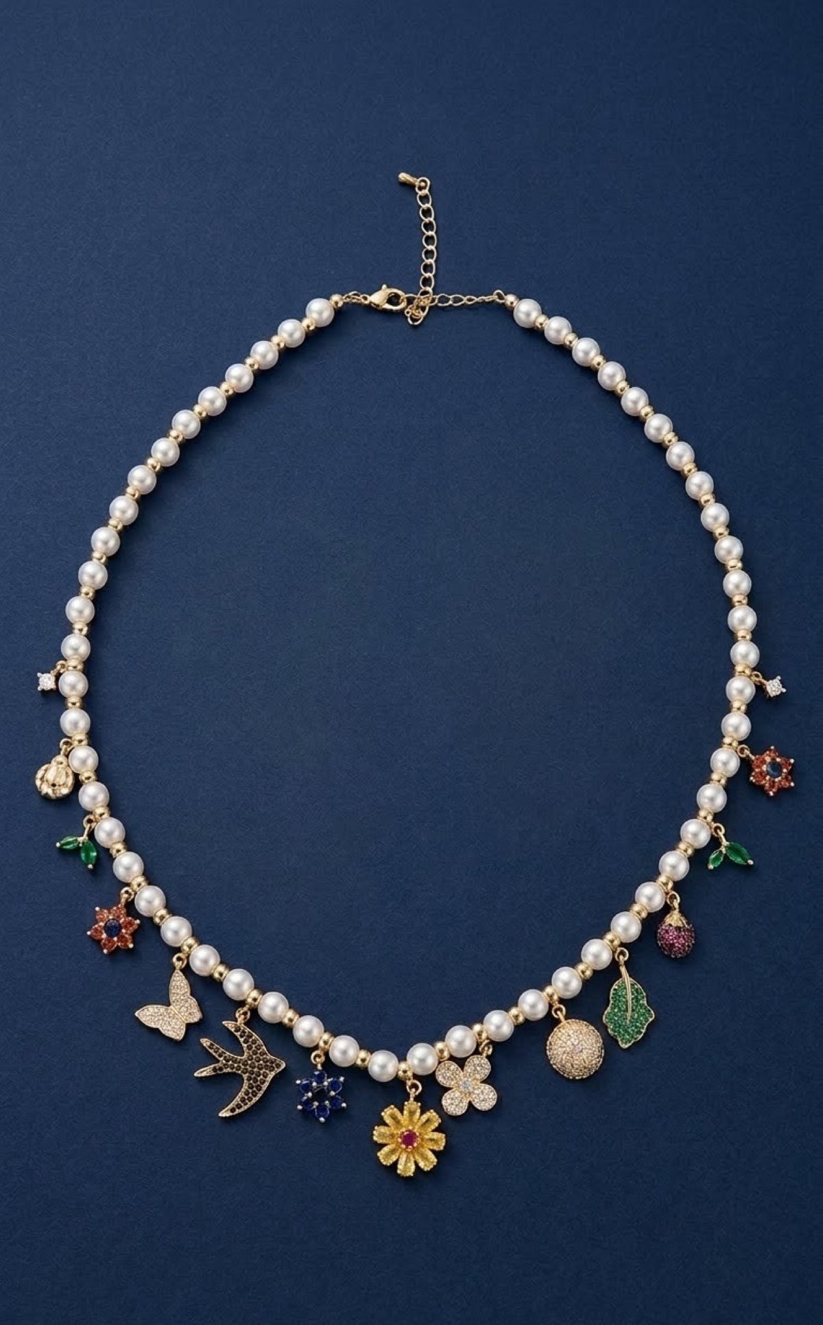 Faux pearl charm necklace set with butterfly, bird and flower charms and hoop earrings - view 3