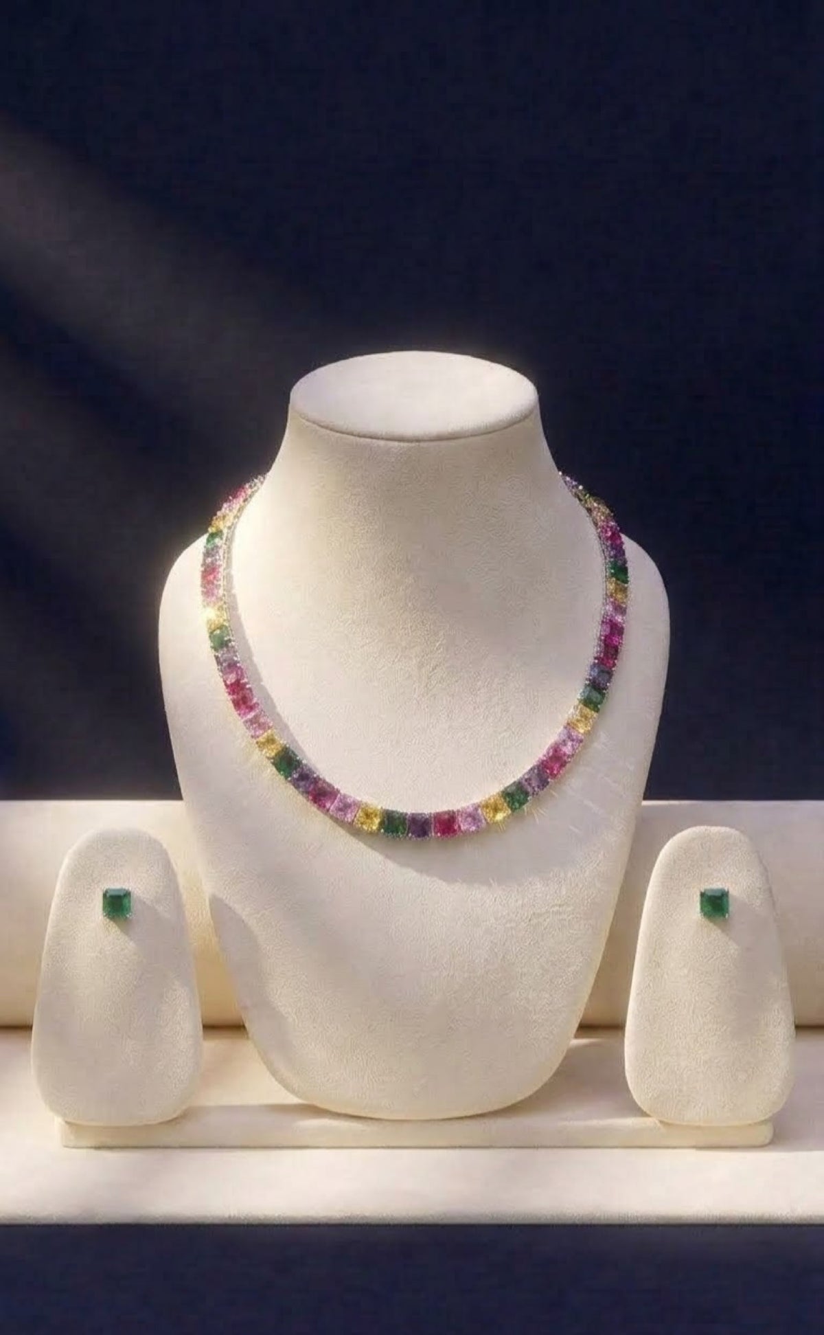 Silver-tone multicolour square-stone tennis necklace with green stud earrings