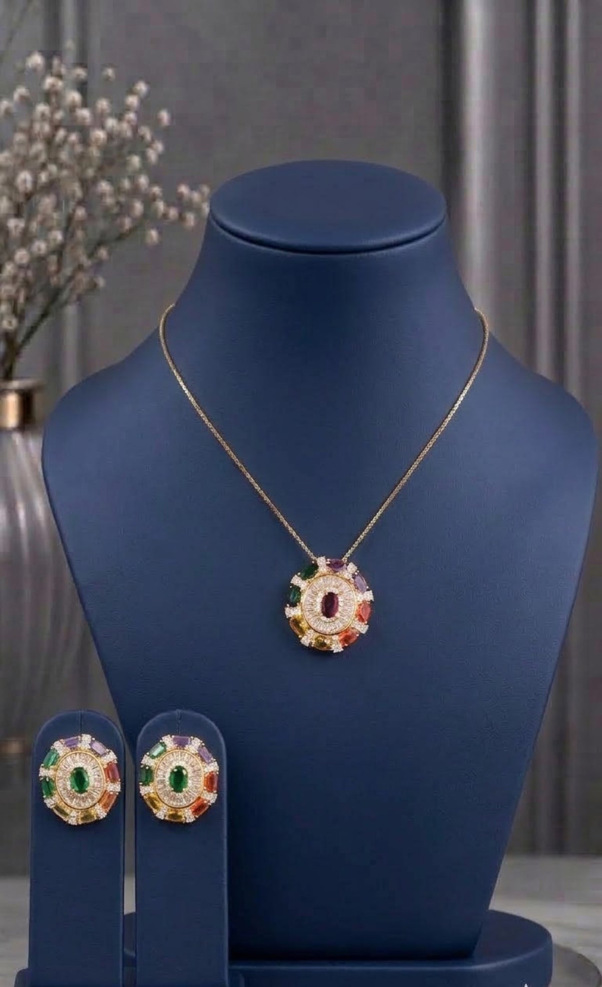 Gold-tone medallion pendant set with multicoloured stones