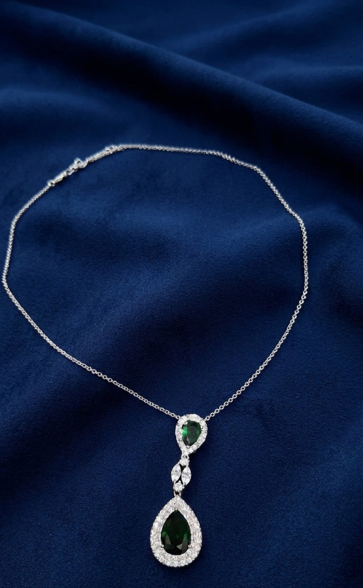 Silver-tone pendant set with emerald-green teardrops and crystal halos - view 2