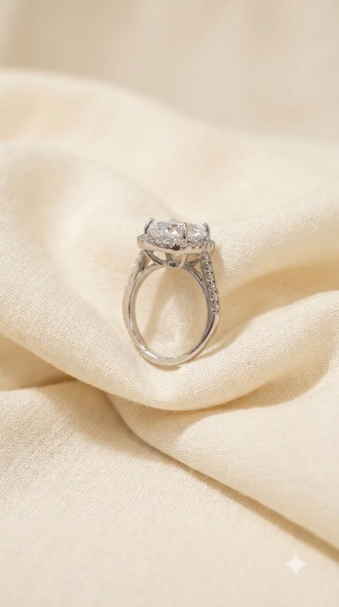 Silver-tone halo ring with a crystal centre stone, diamond-look halo and pavé band - view 6