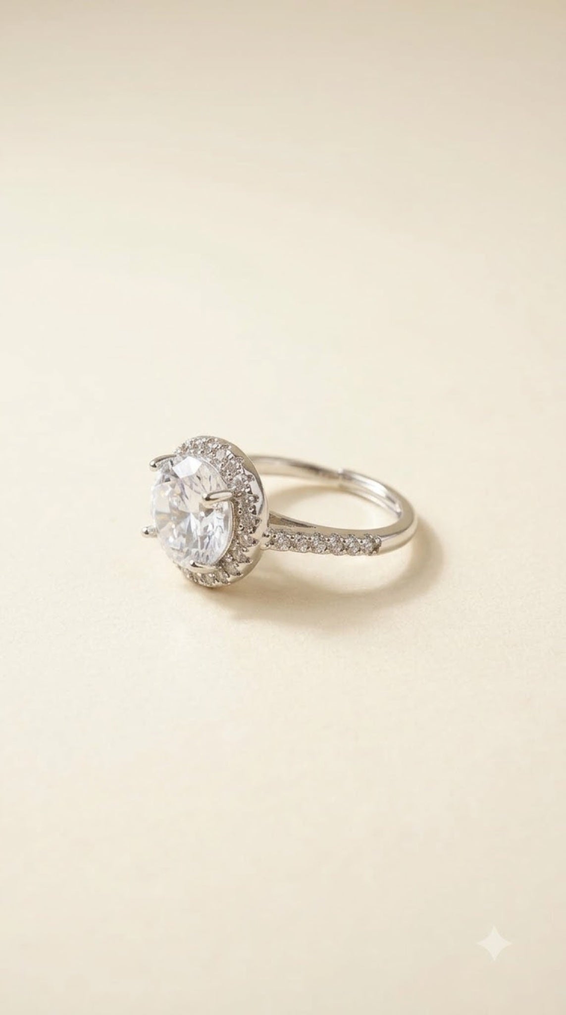 Silver-tone halo ring with a crystal centre stone, diamond-look halo and pavé band - view 7