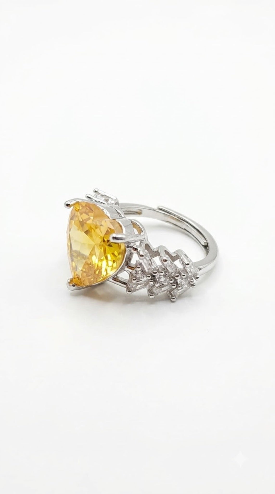 Silver-tone heart-cut crystal ring with stepped baguette diamond-look shoulders - view 10