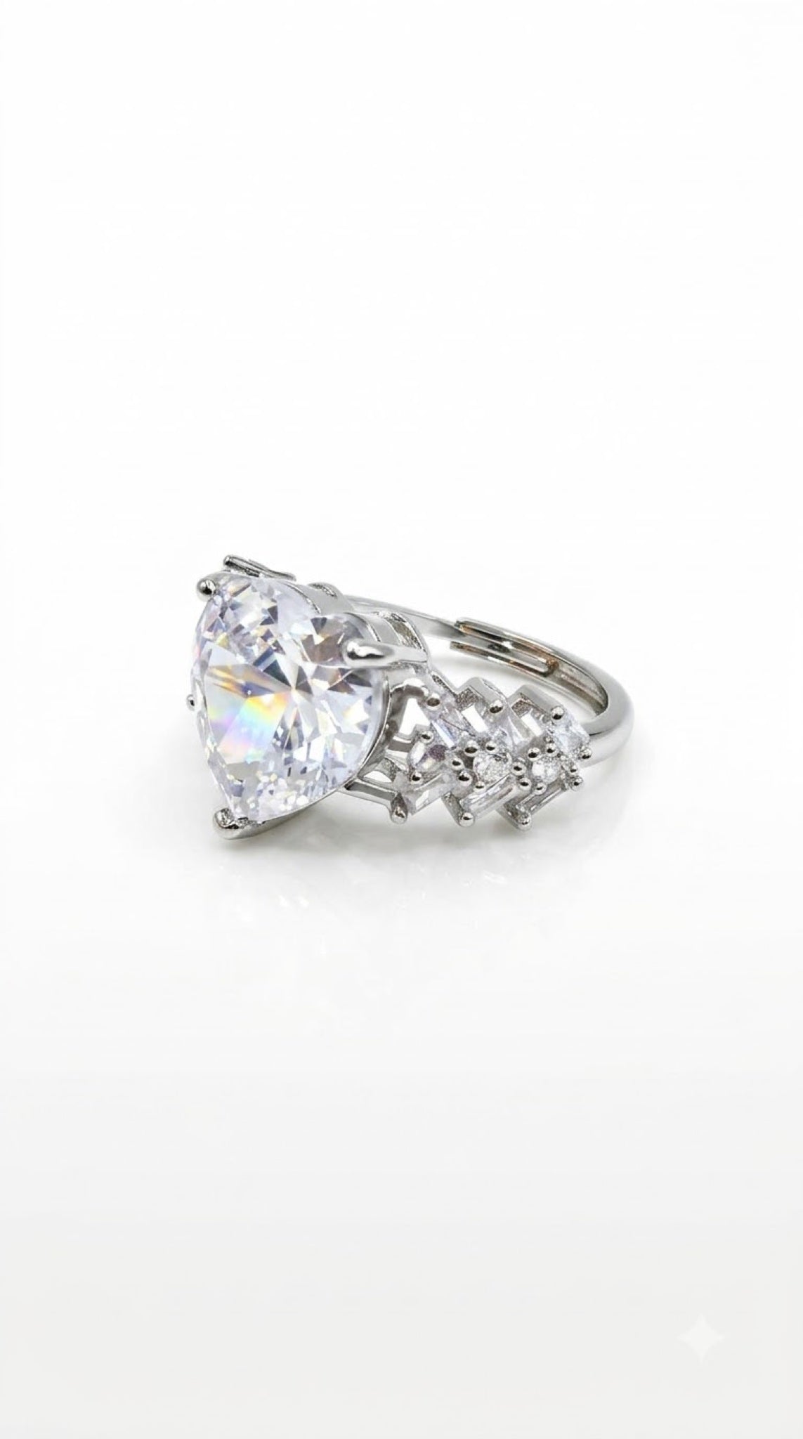 Silver-tone heart-cut crystal ring with stepped baguette diamond-look shoulders - view 6