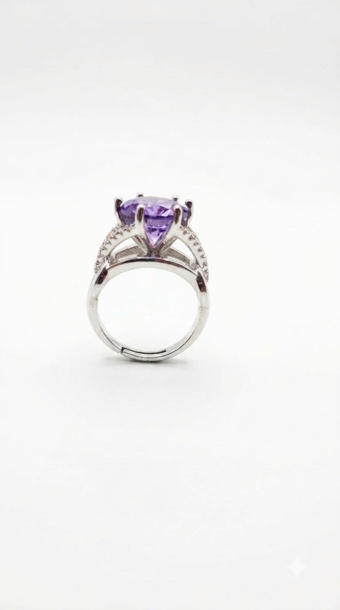 Silver-tone solitaire ring with a round purple crystal in a six-prong crown and pavé split shank - view 3