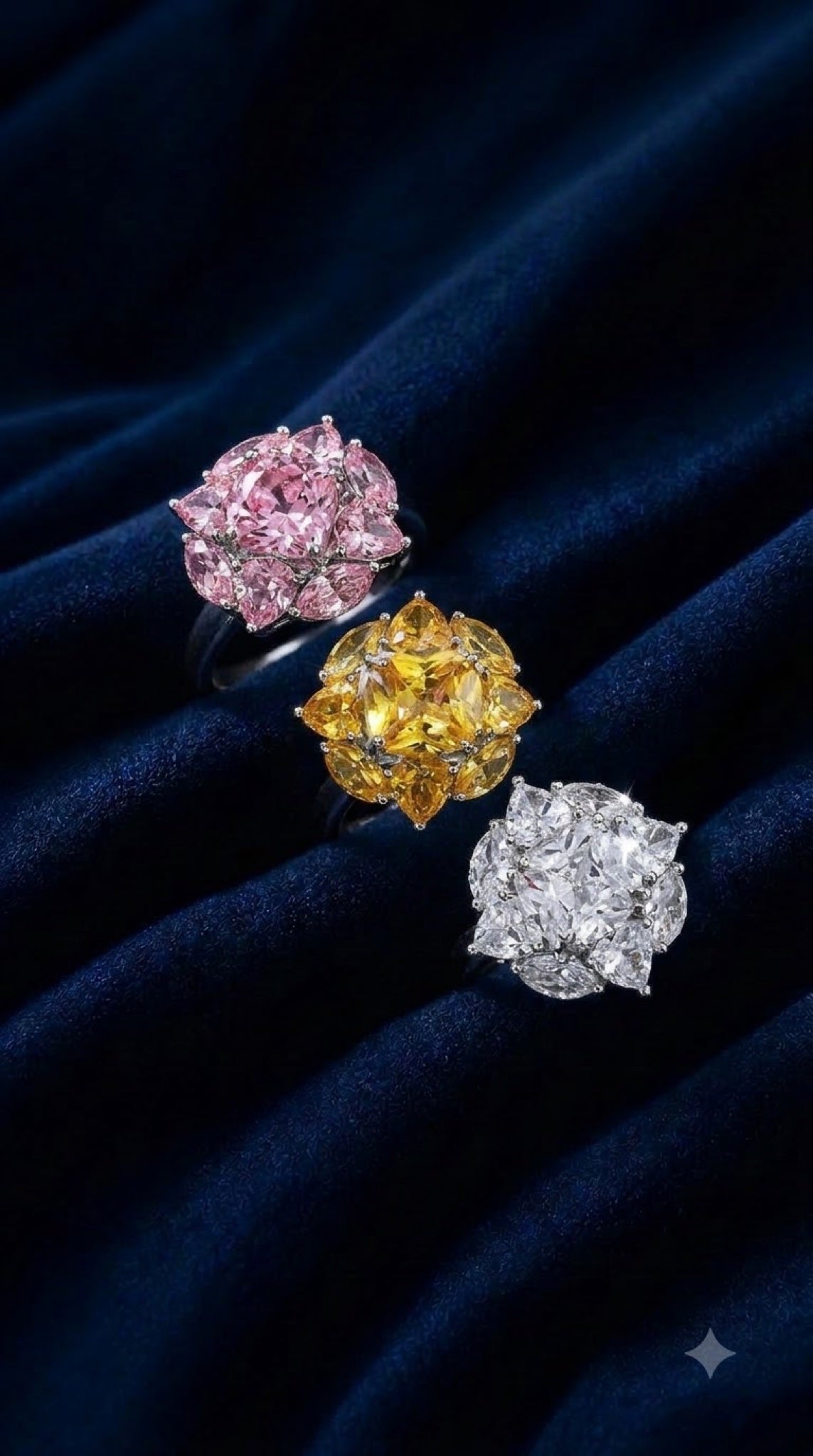 Silver-tone flower cluster cocktail ring with pear-cut crystals in pink, yellow and clear