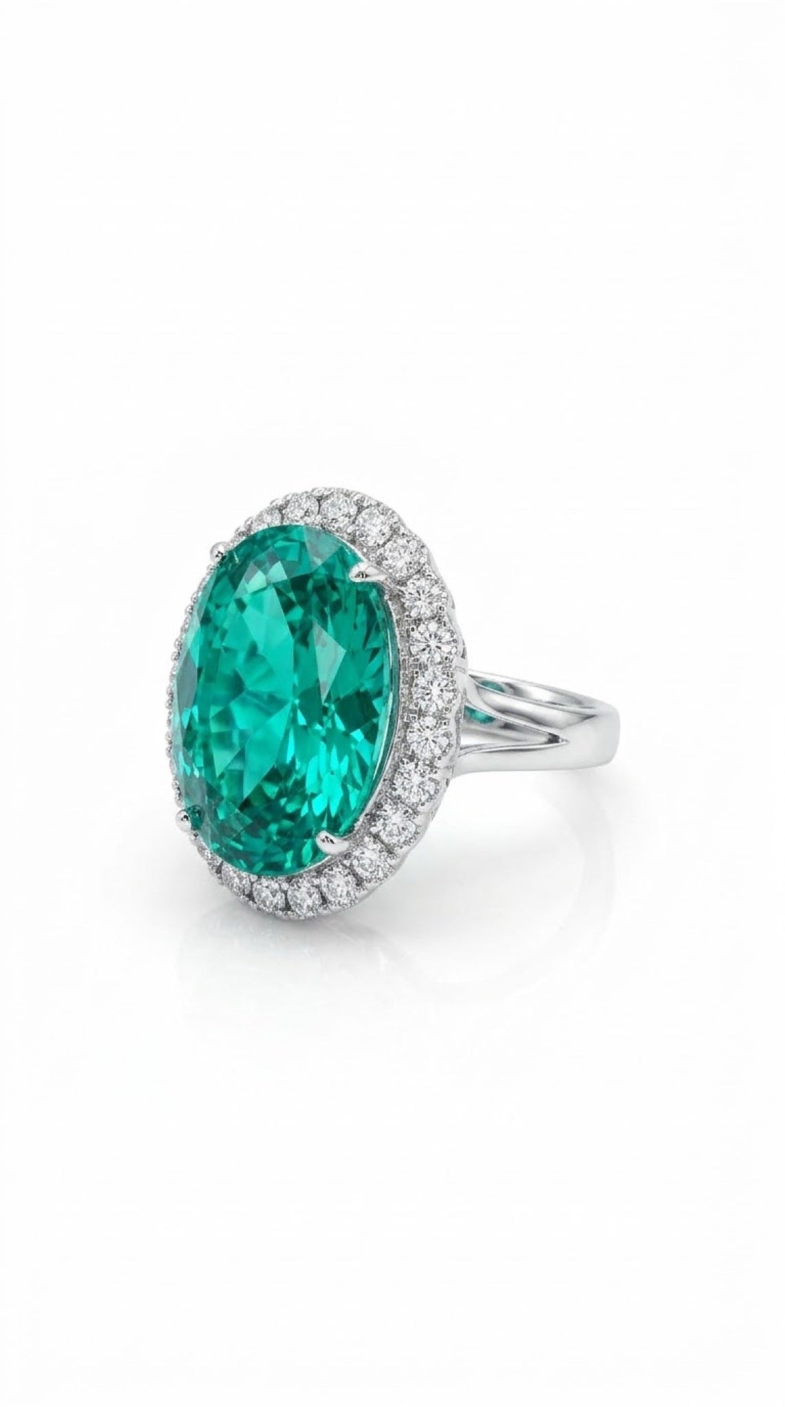 Silver-tone halo ring with an oval seafoam-green crystal surrounded by clear crystals - view 2