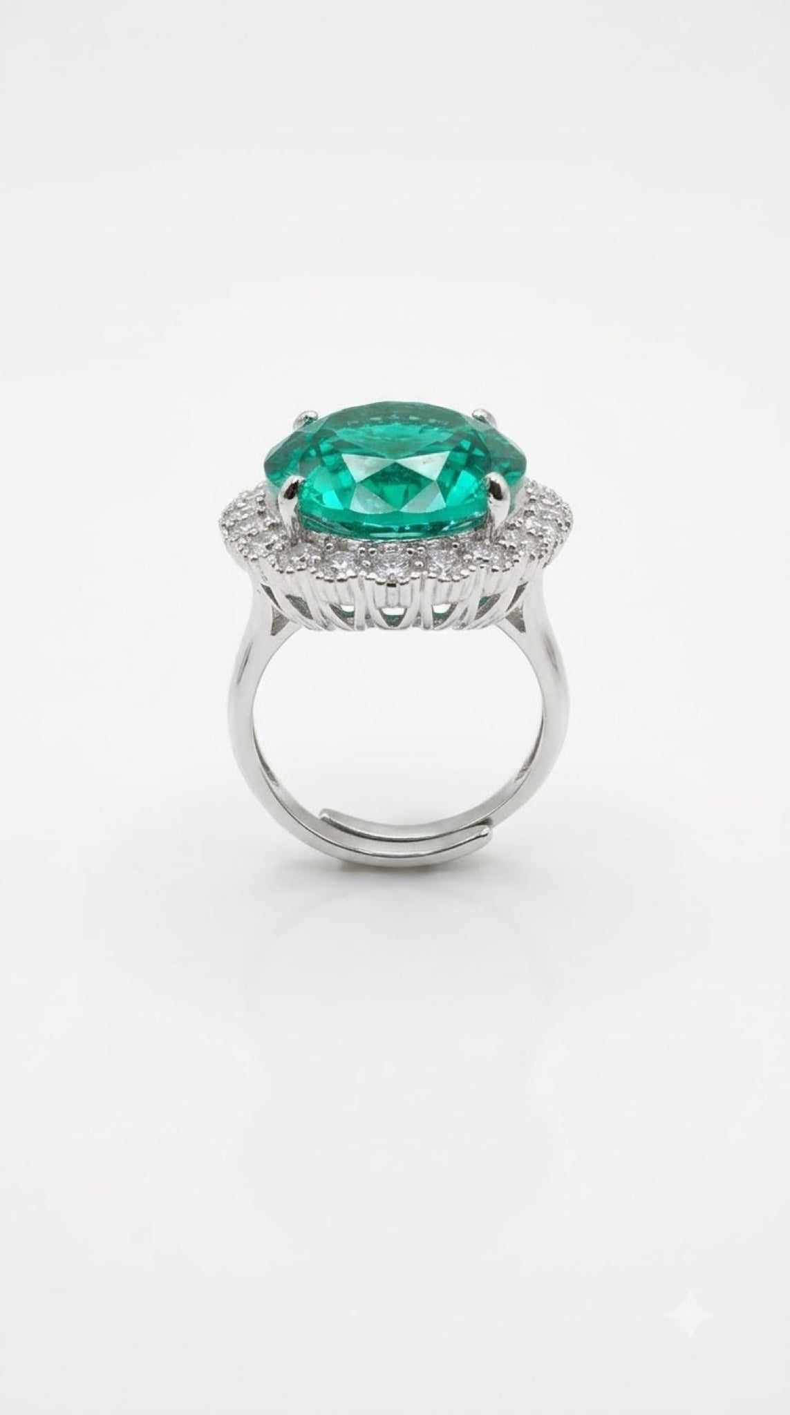 Silver-tone halo ring with an oval seafoam-green crystal surrounded by clear crystals - view 3