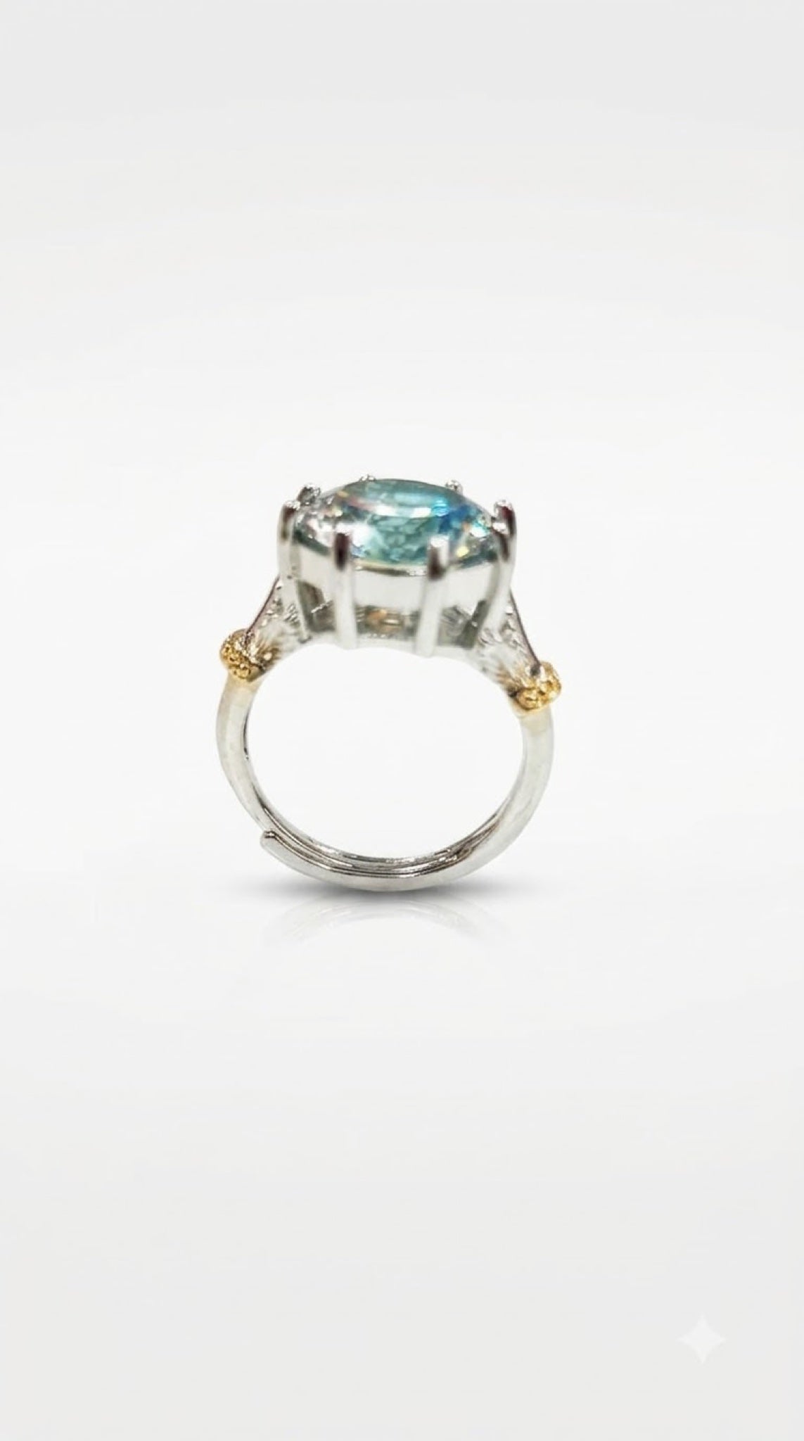 Silver-tone crown solitaire ring with a round crystal, trillion side stones and gold-tone beads - view 13