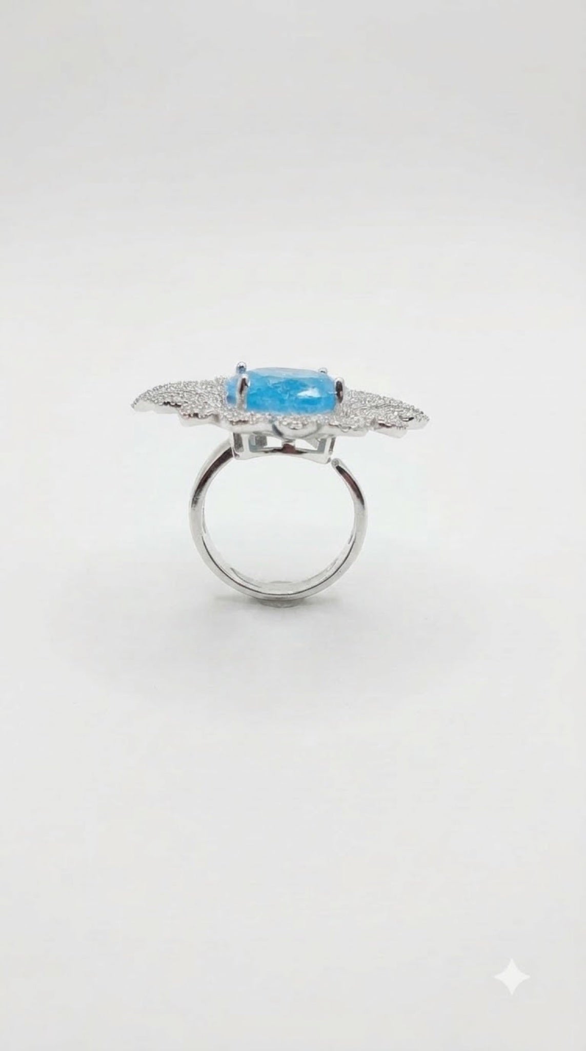 Silver-tone openwork petal cocktail ring with an oval crackle-finish stone - view 3