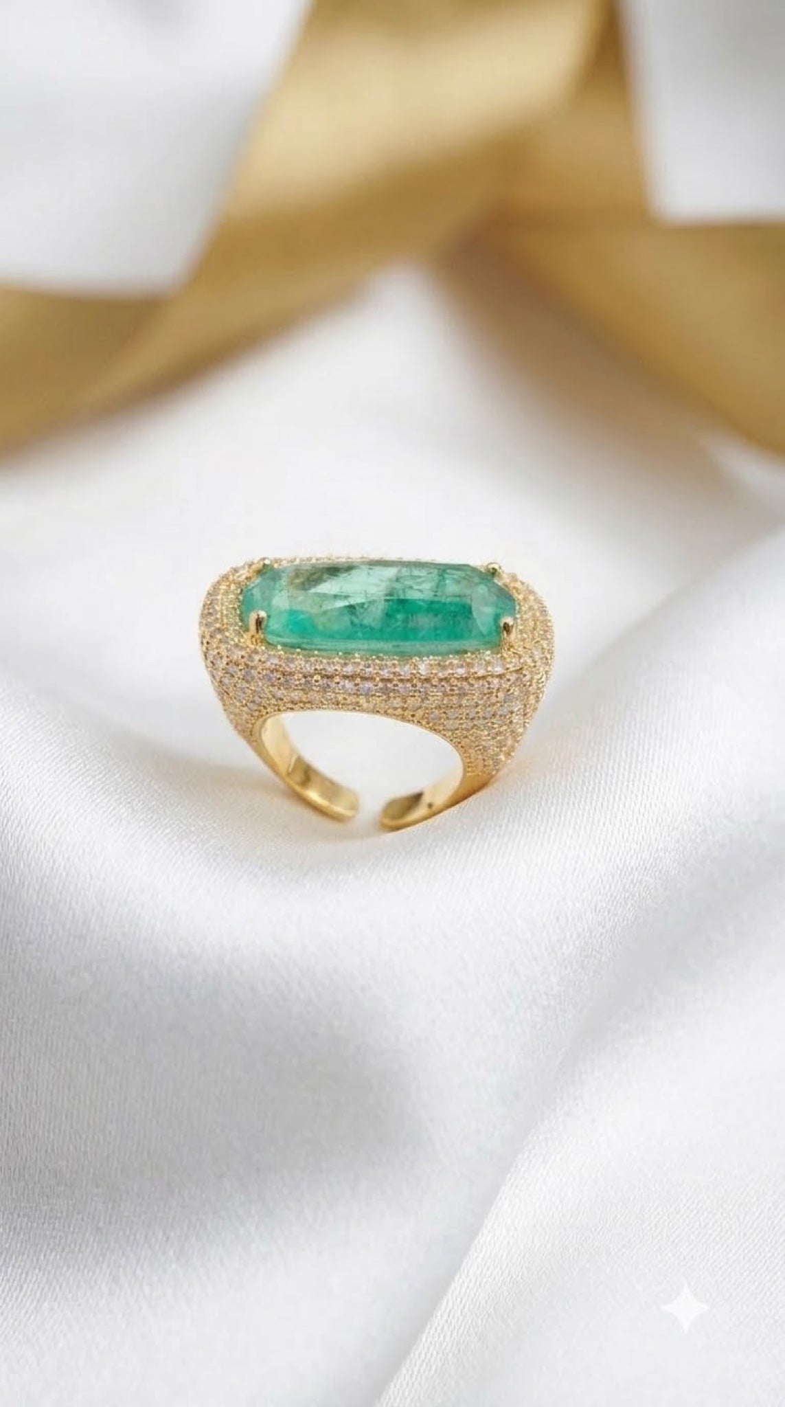Gold-tone pavé crystal ring with rectangular green stone