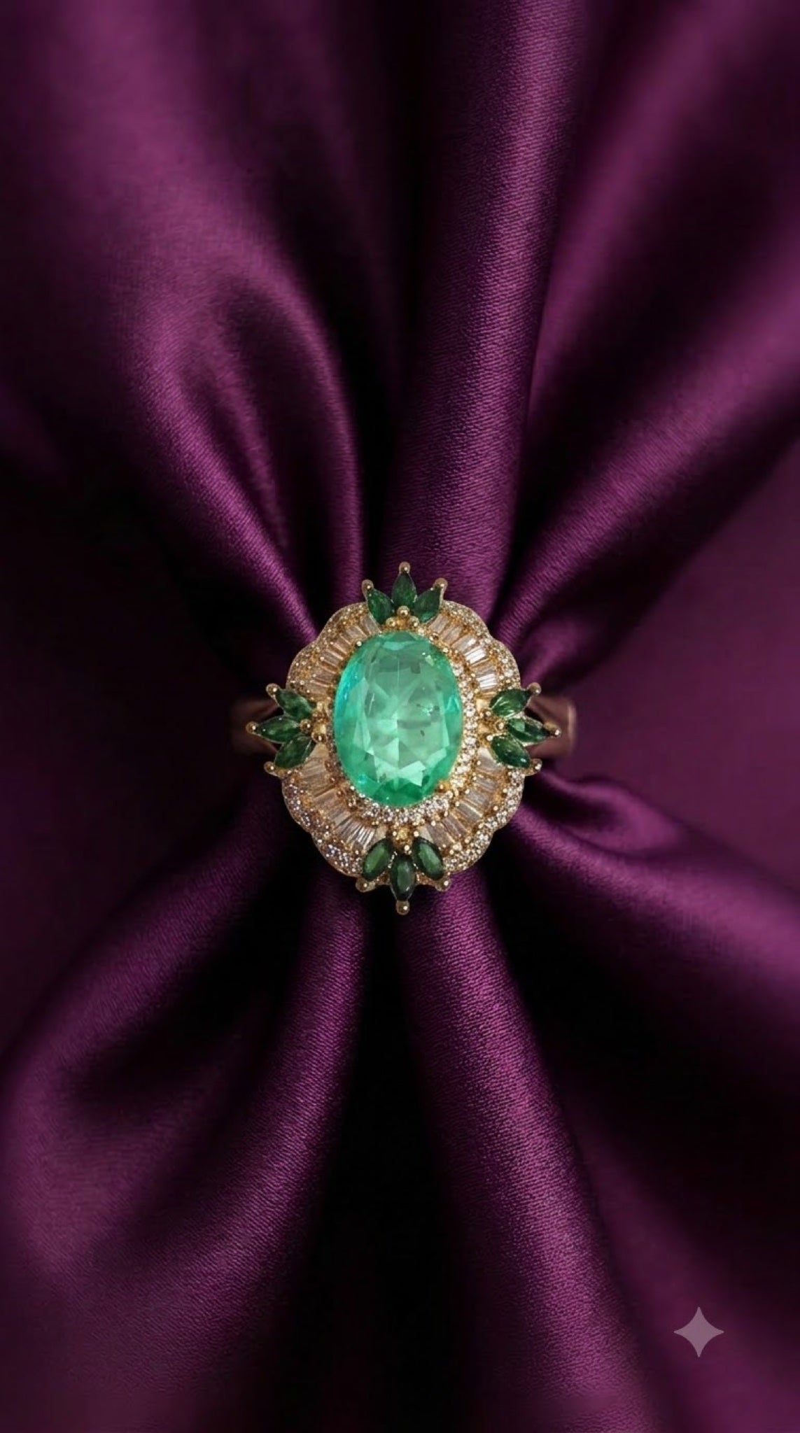 Ornate gold-tone cocktail ring with an oval centre stone, baguette halo and marquise accents - view 2