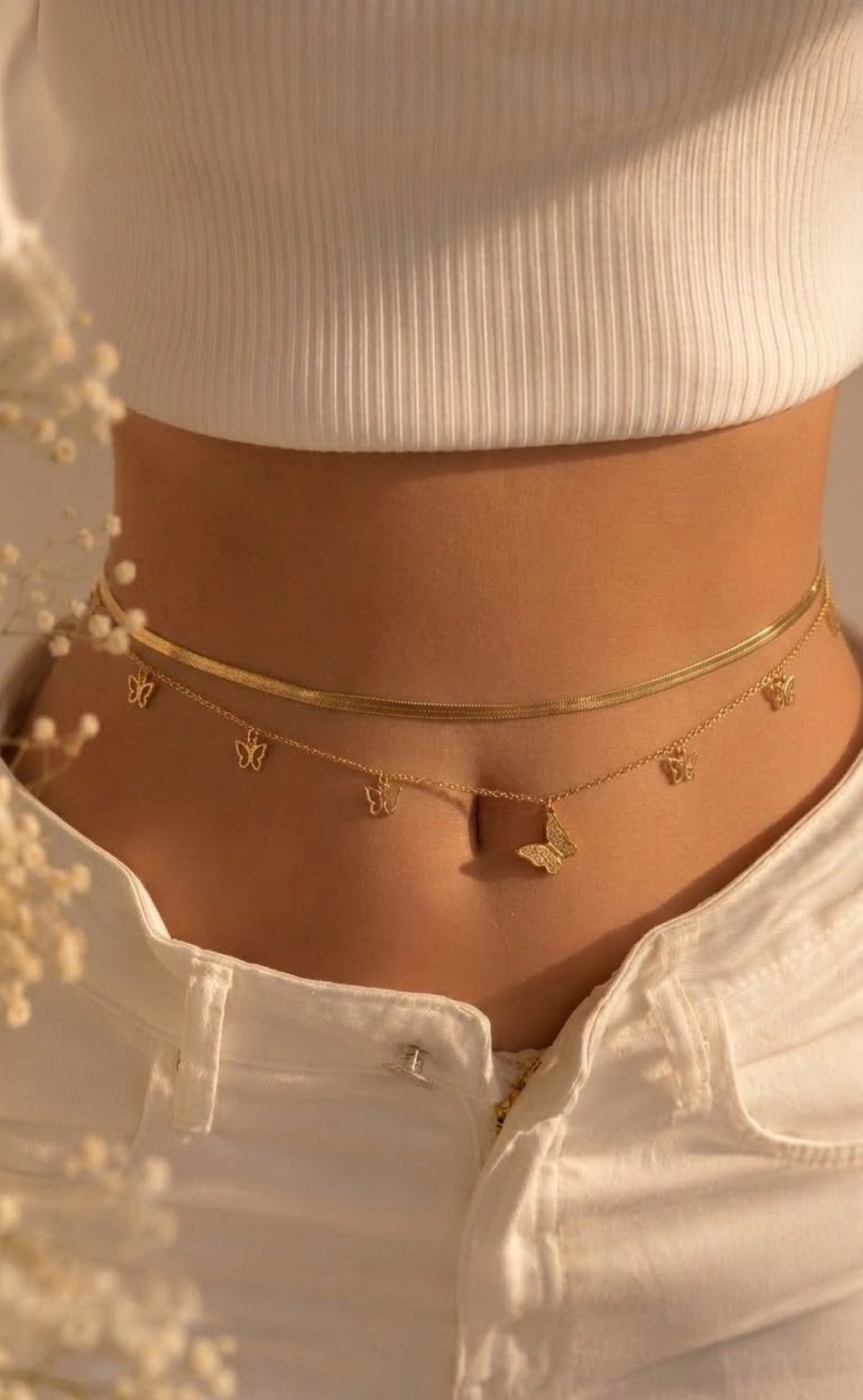 Layered gold-tone herringbone and butterfly charm waist chain