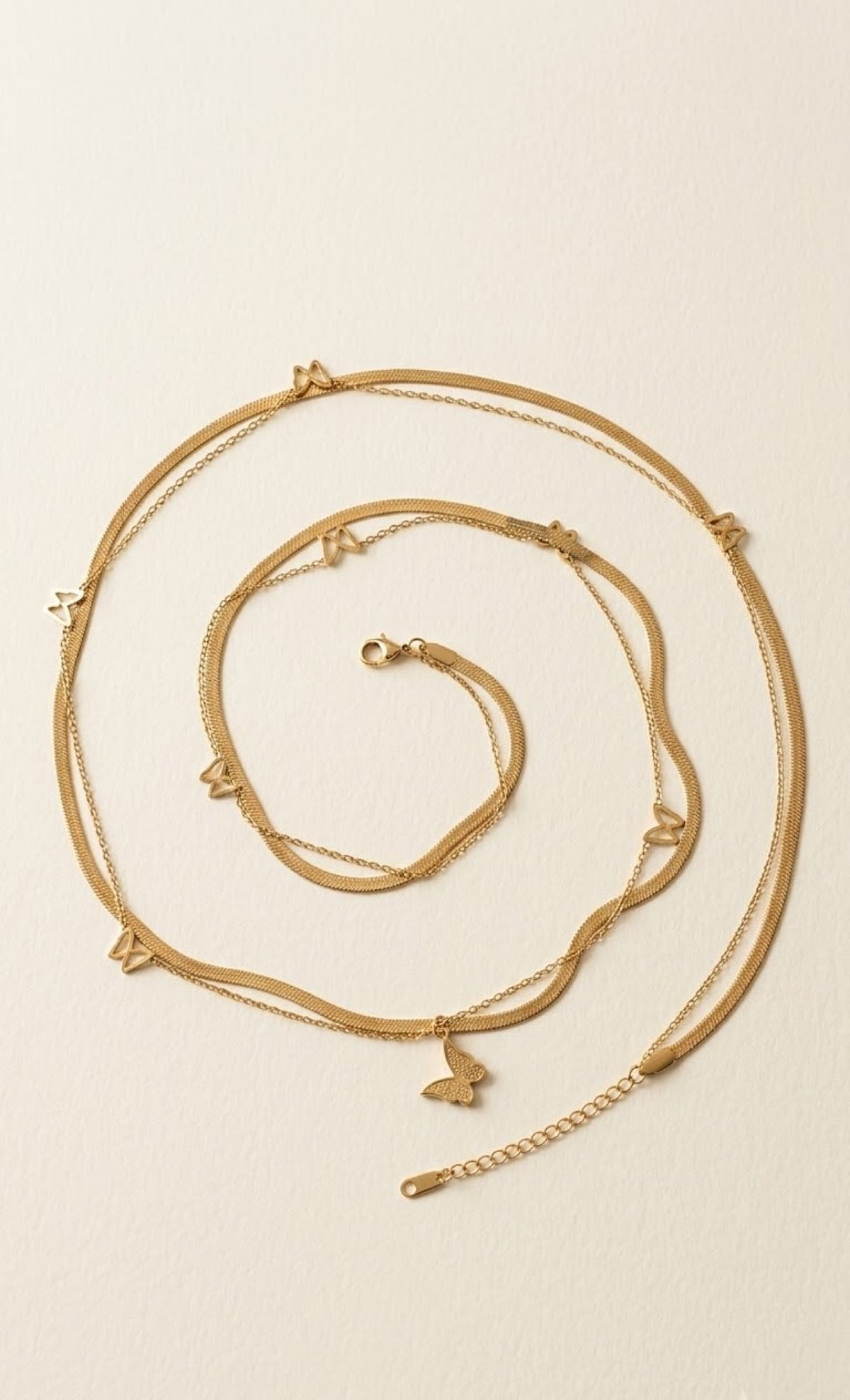 Layered gold-tone herringbone and butterfly charm waist chain - view 2