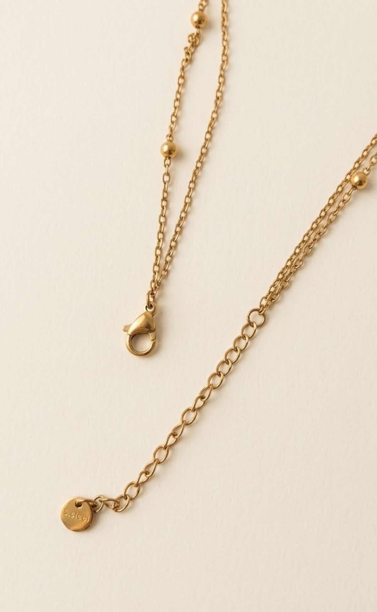 Double gold-tone satellite waist chain with white enamel elephant charm - view 3
