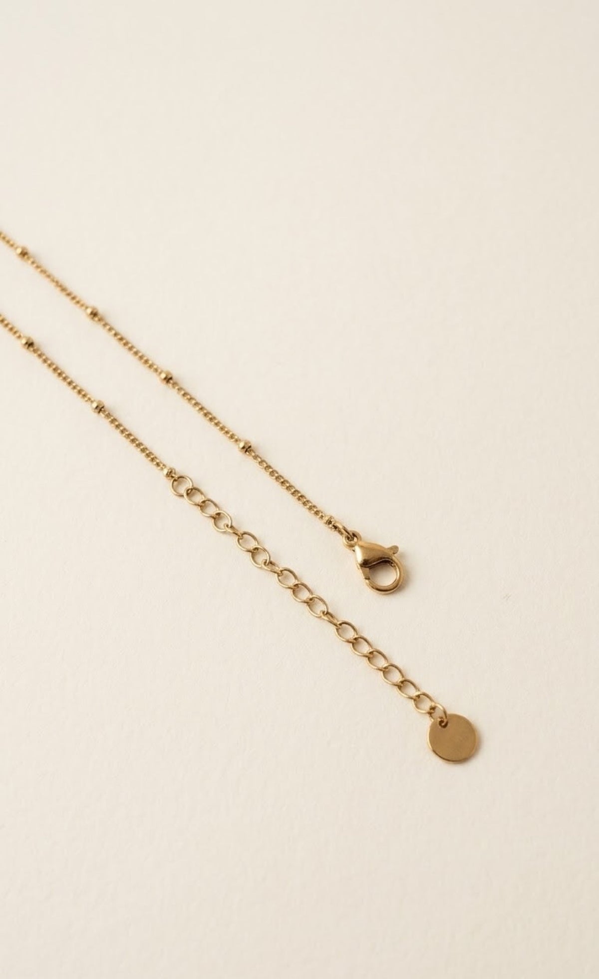 Gold-tone satellite waist chain with green heart stones - view 3